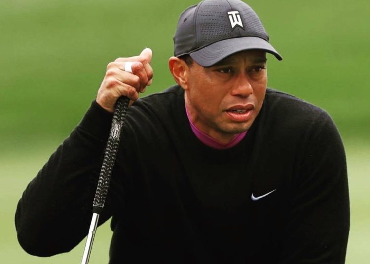 Woods finishes day on 66th as Thomas takes one-stroke lead