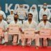 QTJKF holds belt promotion tests for Qatari karate team, coaches