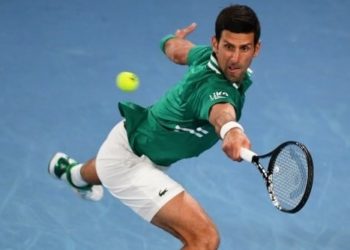 Djokovic fights back to beat Tiafoe in second round