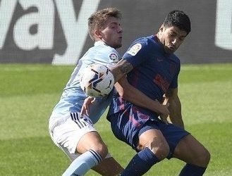 Suarez late goal helps Atletico Madrid overcome Osasuna