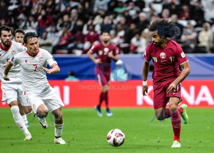 Qatar beat Tajikstan to become first team to qualify for Round of 16