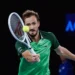 Medvedev beats heat and nerves to ease into Australian Open second round