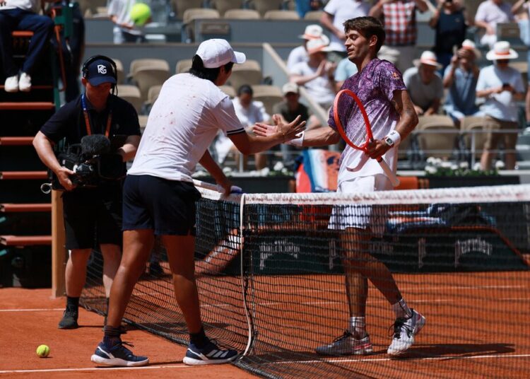 Cobolli sweeps past Tien to reach French Open fourth round