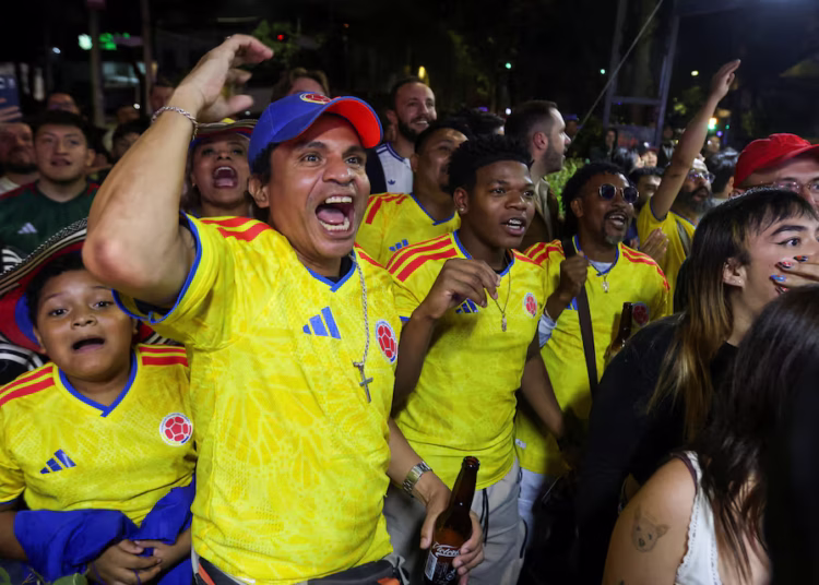 Colombian fans turn Mexico City yellow ahead of World Cup opener