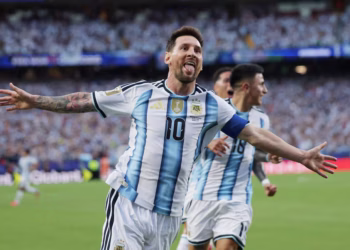 Messi hat-trick powers Argentina past Algeria and into World Cup history