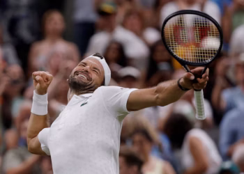 Dimitrov returns to Wimbledon fourth round a year after injury heartbreak