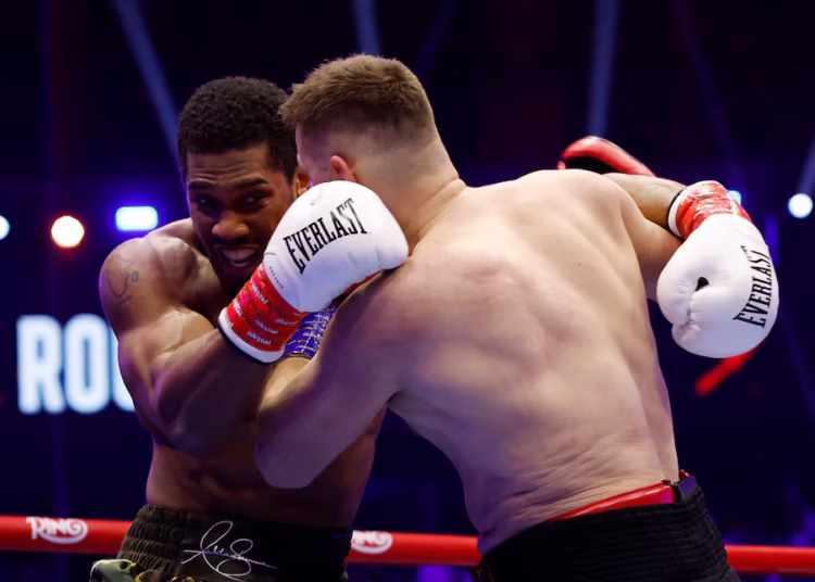 Joshua Rallies to Stop Prenga, Sets Up Long-Awaited Fury Clash