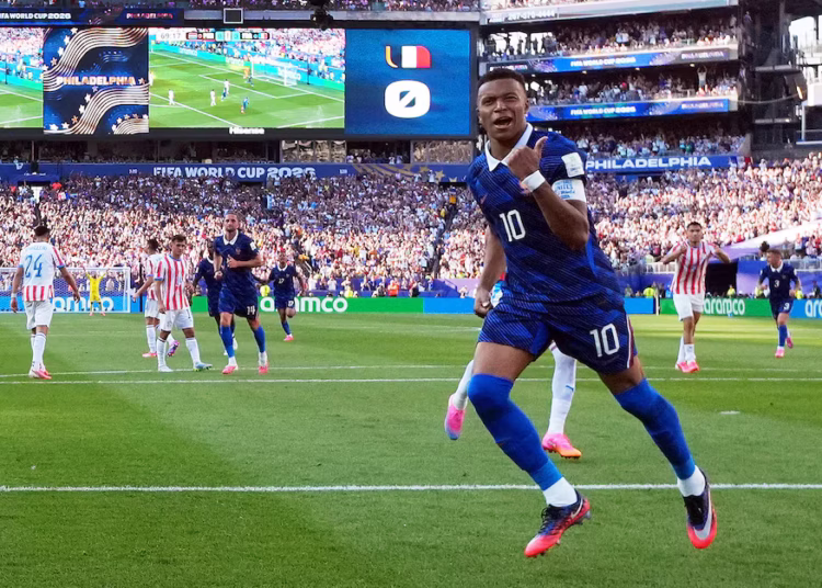 Mbappe keeps cool as France survive furnace against Paraguay
