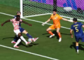 Balogun goes from hero to suspended spectator as U.S. reach last 16