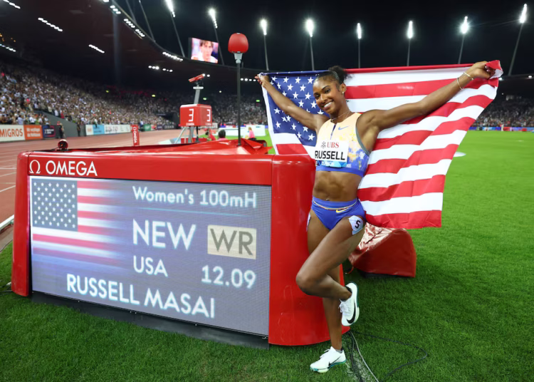 American Russell hurdles to world record in Zurich