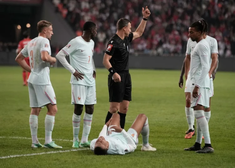 Mbappe forced off with apparent knee injury after France goal