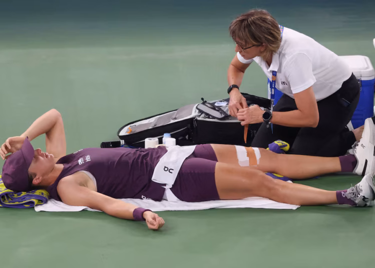 Injured Swiatek loses to childhood friend Chwalinska in Wuhan semi-final