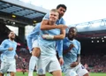 Man City beat 10-man Liverpool 3-0 to maintain perfect start