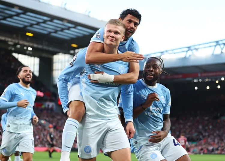 Man City beat 10-man Liverpool 3-0 to maintain perfect start