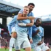 Man City beat 10-man Liverpool 3-0 to maintain perfect start